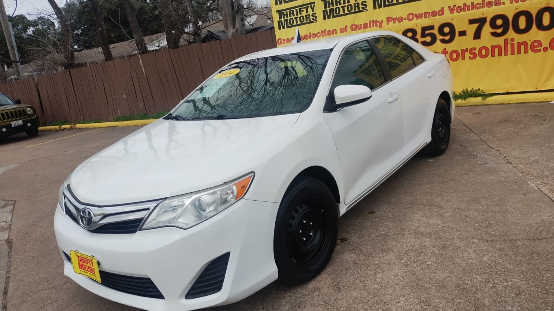 2014 Toyota Camry (4T4BF1FK1ER) , located at 16710 Clay Rd., Houston, TX, 77084, (281) 859-7900, 29.834864, -95.656166 - Photo#5